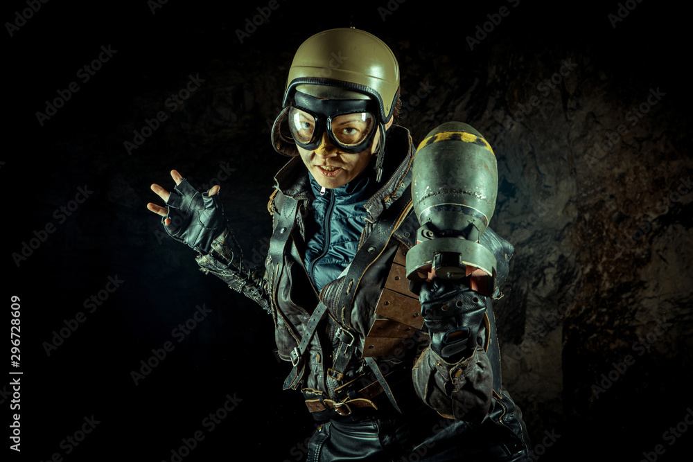 Soldier woman with the bomb on post apocalyptic background. Soldier woman with the bomb on post apocalyptic background.