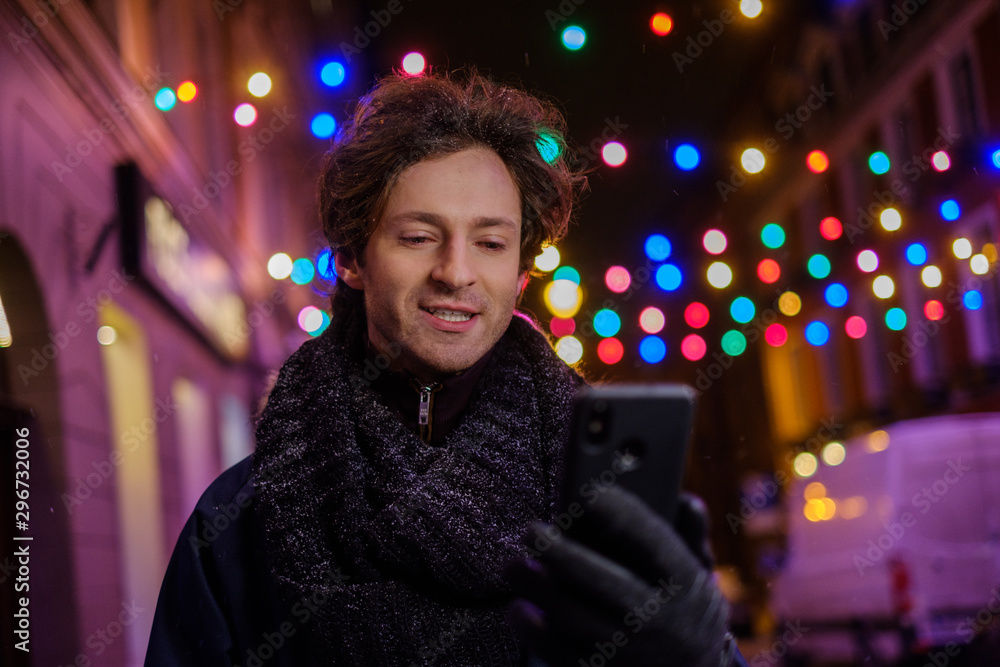 Man making selfie on a cold winter evening