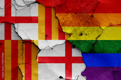 flags of Barcelona and LGBT painted on cracked wall