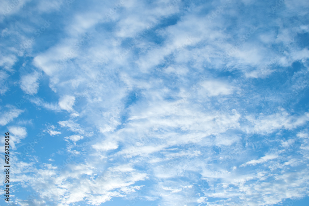 Blue sky with clouds and sun. Blue sky with clouds and sun.