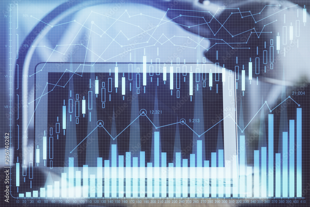 Multi exposure of forex graph and work space with computer. Concept of international online trading. Multi exposure of forex graph and work space with computer. Concept of international online trading.