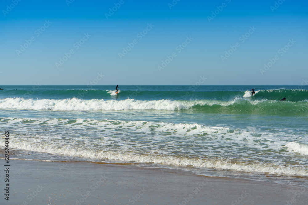 Sea waves in sunny day. Santa Maria del Mar beach in Cadiz , Andalusia, Spain Sea waves in sunny day. Santa Maria del Mar beach in Cadiz , Andalusia, Spain
