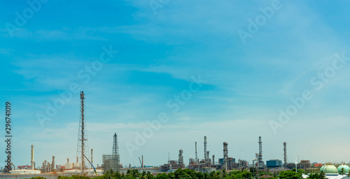 Oil refinery or petroleum refinery plant. Power and energy industry. Oil and gas production plant. Petrochemical plant. Chemical pipeline. Natural gas storage tank with sky. Petroleum engineering.