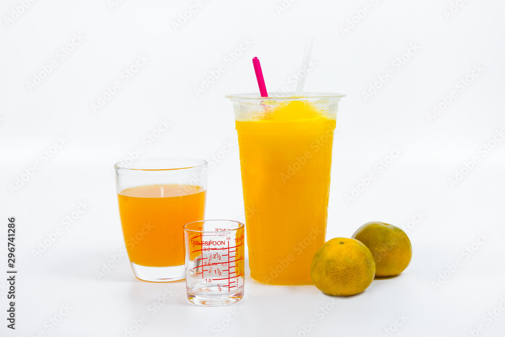 Slush ice with orange in Plastic Cup white background. Slush ice with orange in Plastic Cup white background.