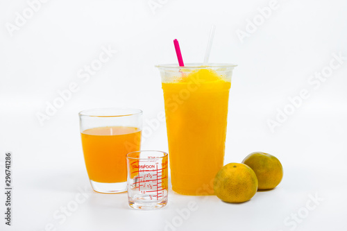Slush ice with orange in Plastic Cup white background.