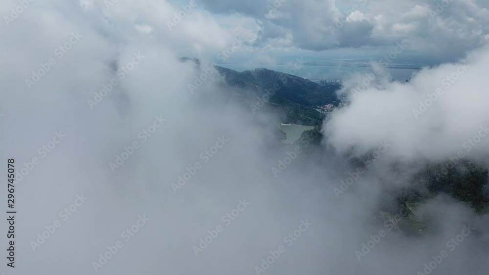 Fly over foggy cloud toward Ayer Itam dam, Penang. Fly over foggy cloud toward Ayer Itam dam, Penang.