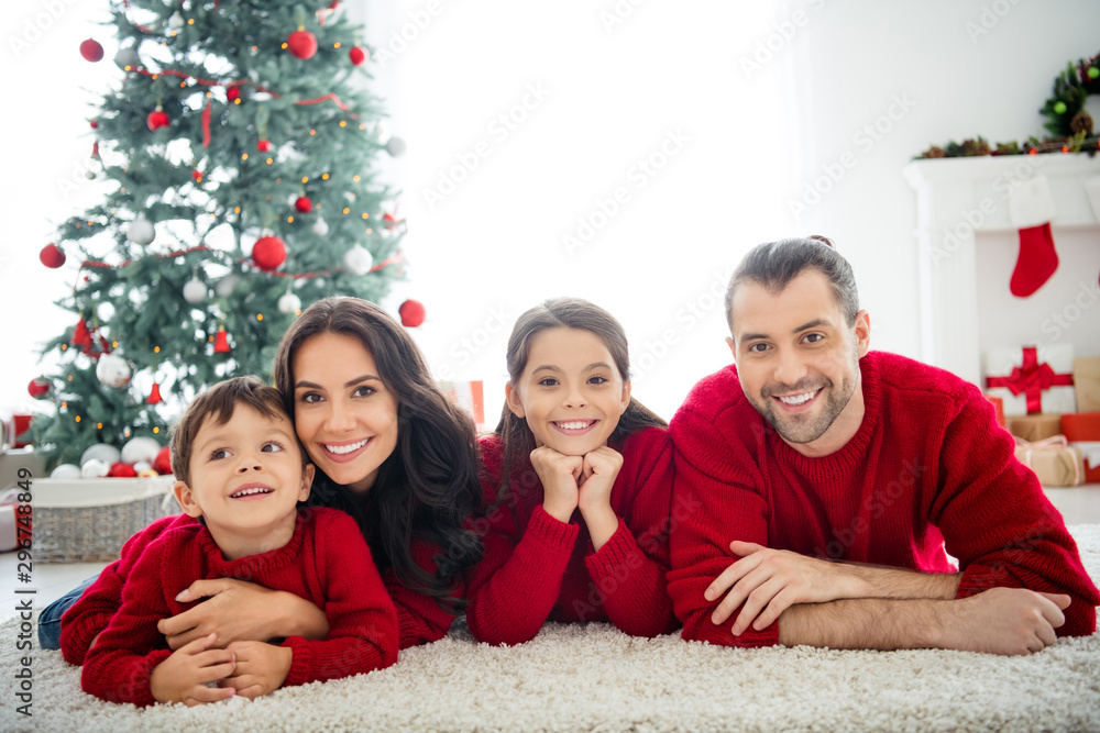 Portrait of four nice attractive lovely charming idyllic dreamy cheerful cheery affectionate full big family celebrating newyear spending weekend rest relax in light white interior living-room Portrait of four nice attractive lovely charming idyllic dreamy cheerful cheery affectionate full big family celebrating newyear spending weekend rest relax in light white interior living-room