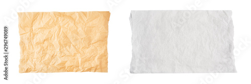 Crumpled piece of brown and white parchment or baking paper isolated on white background. Top view. Copy space for text. Design element.