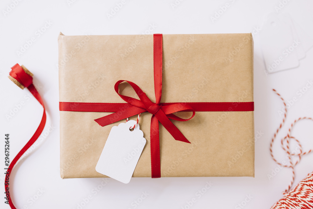 Big gift box with red ribbon - obrazy, fototapety, plakaty 