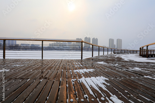 Fototapete wood trestle bridge in the snow, China