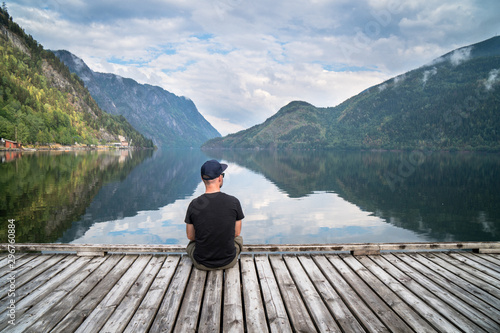Fototapeta Naklejka Na Ścianę i Meble -  man looking on the lake and fjords