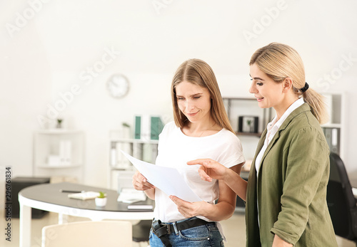 Businesswomen Discussing Do...