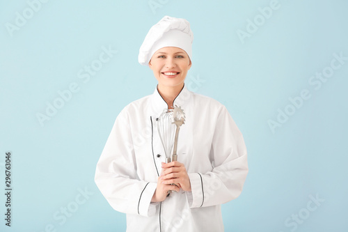 Beautiful female chef with ...