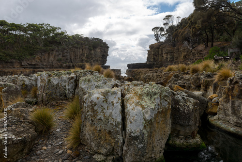 Tasmans Arch, former sea cave, geological formations at Tasman National Park, Tasmania, Australia. 