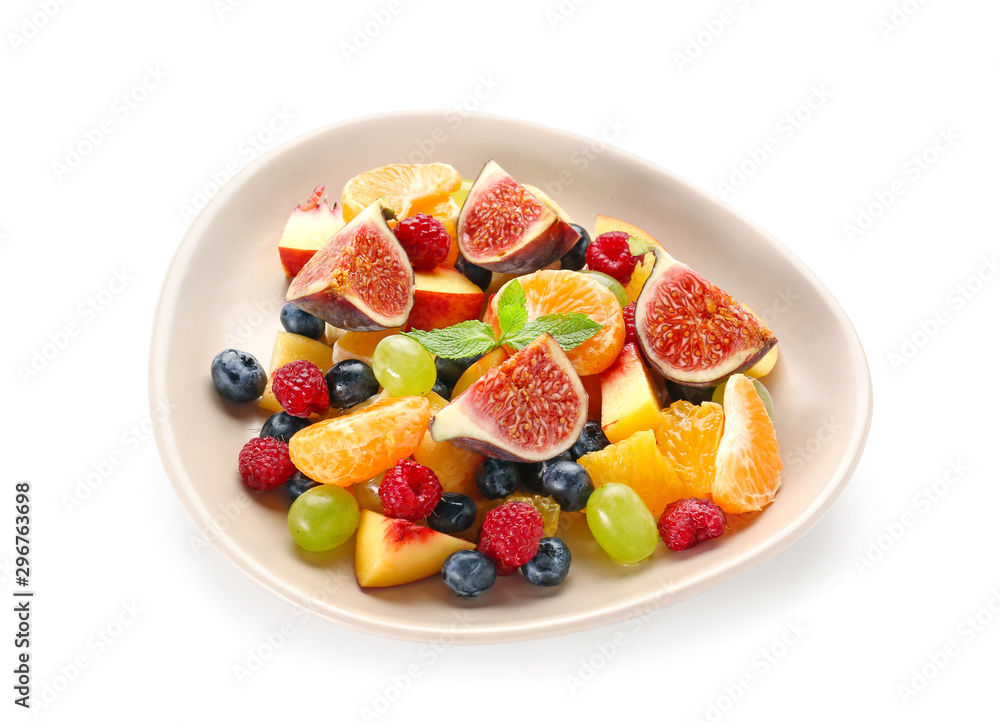 Plate with tasty fruit salad on white background Plate with tasty fruit salad on white background