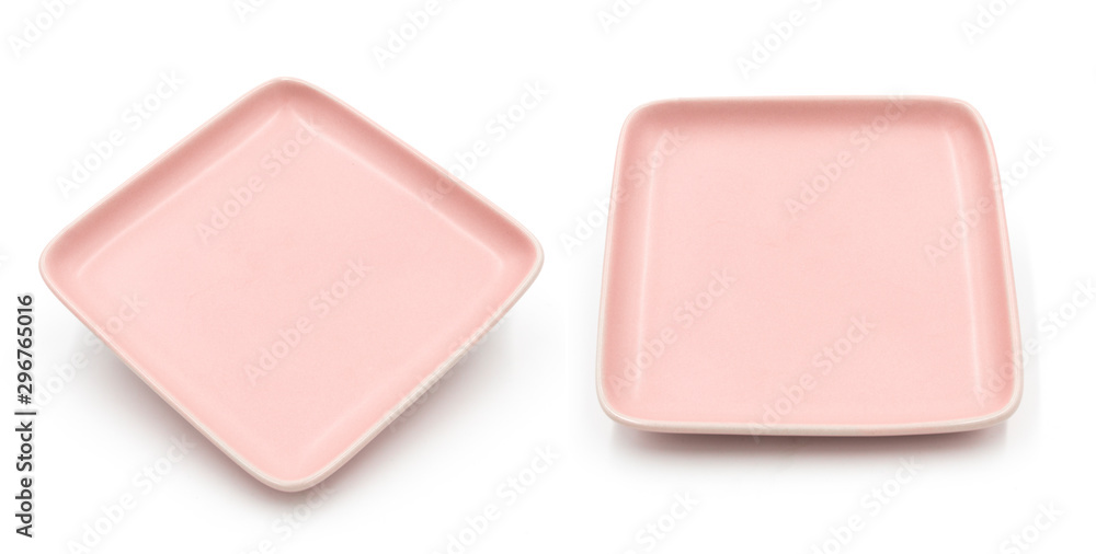 Set of pink square ceramic dishes isolated on white background Set of pink square ceramic dishes isolated on white background