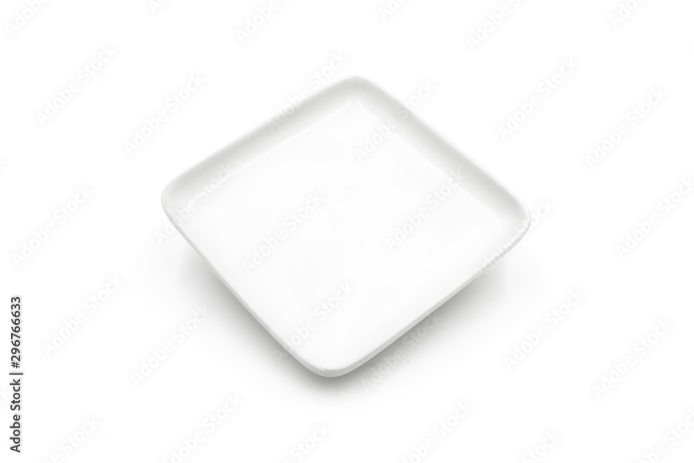 One square ceramic dish isolated on white background One square ceramic dish isolated on white background