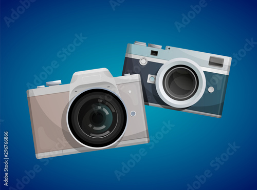 Two compact cameras on blue background