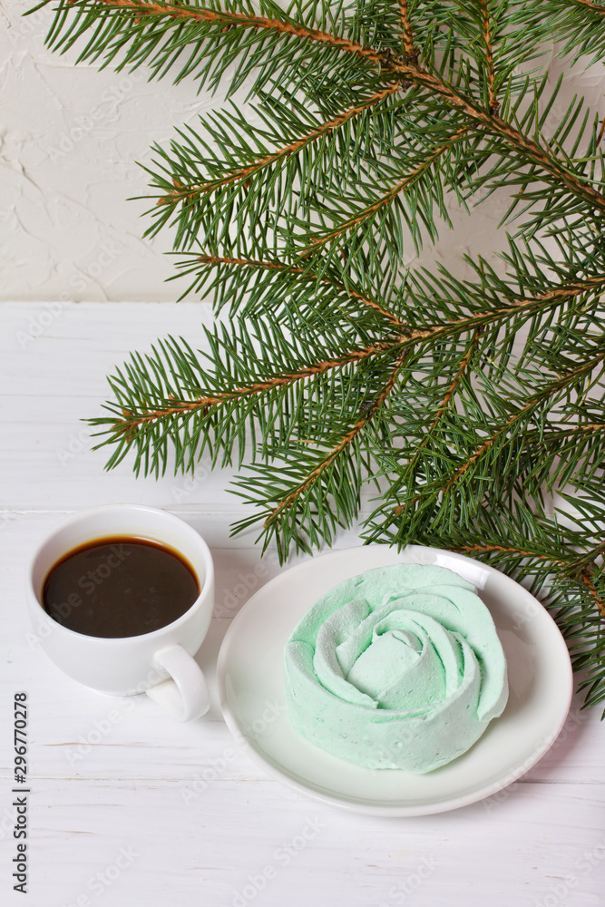 Desserts for winter parties. Sweets and spruce branch. Desserts for winter parties. Sweets and spruce branch.
