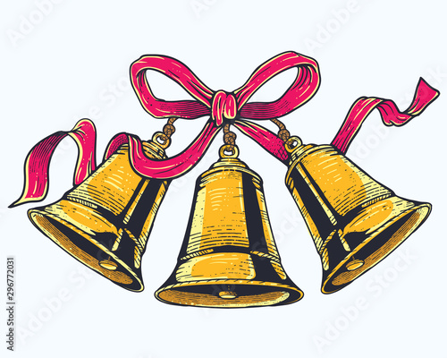 Christmas bells with red ribbon and Christmas floral