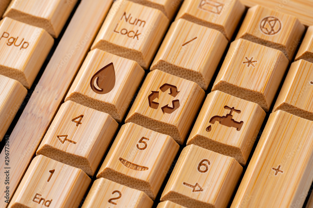 Recycle icon on computer keyboard for green and eco concept Recycle icon on computer keyboard for green and eco concept