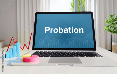 Probation – Statistics/Business. Laptop in the office with term on the display. Finance/Economics.