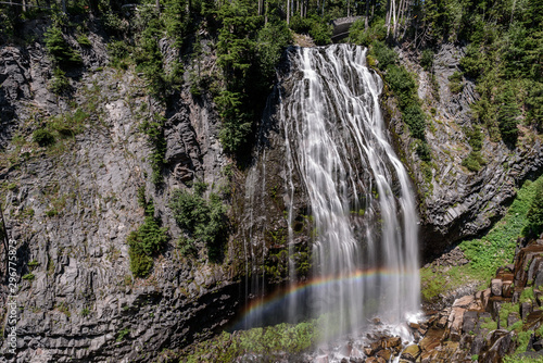 Narada Falls  in Mount Rainier National Park. A rainbow has formed at the bottom of the falls