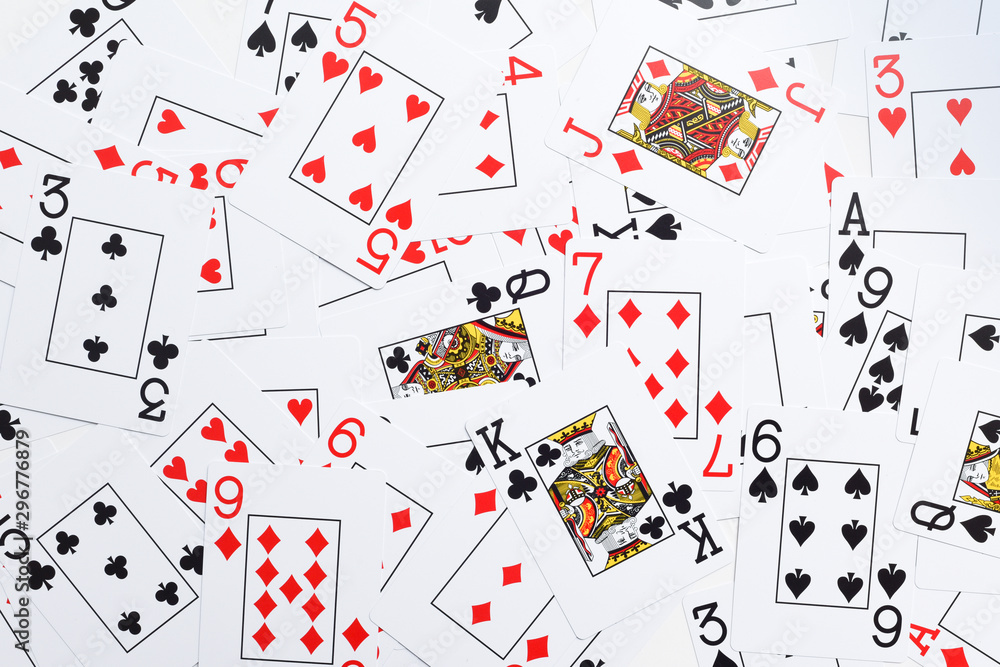 Deck of playing cards shuffled at random shot from directly above Deck of playing cards shuffled at random shot from directly above