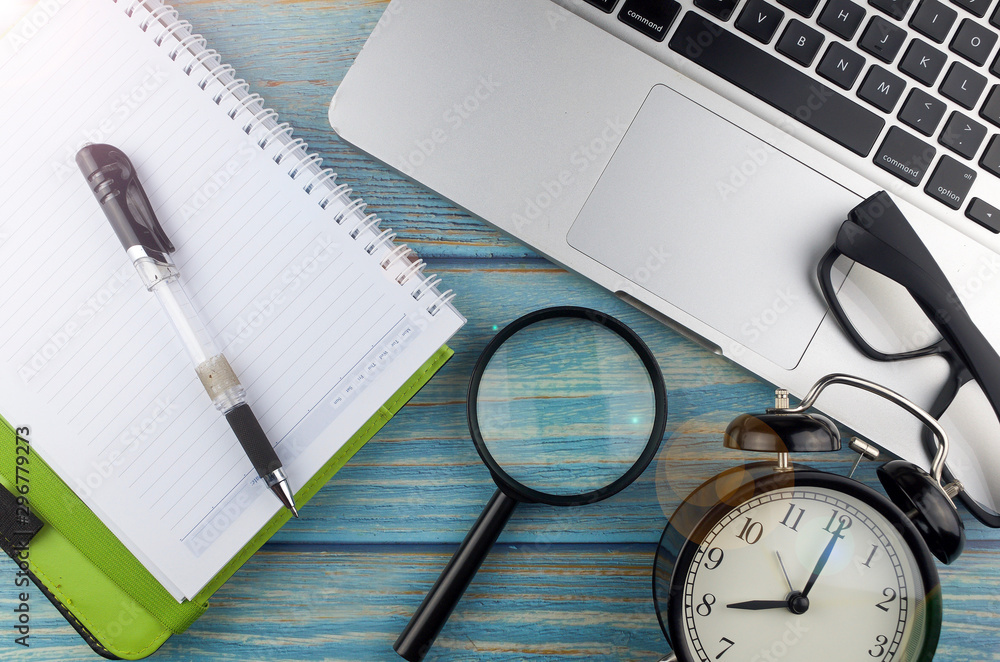 Flat lay business workplace and objects on wooden background. Selective focus. Flat lay business workplace and objects on wooden background. Selective focus.