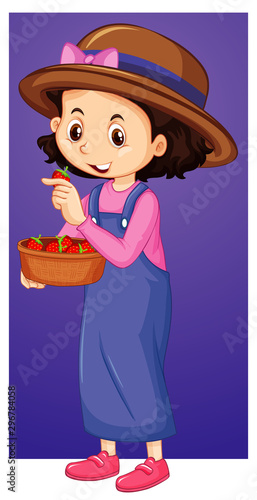 Happy girl with tray of strawberries