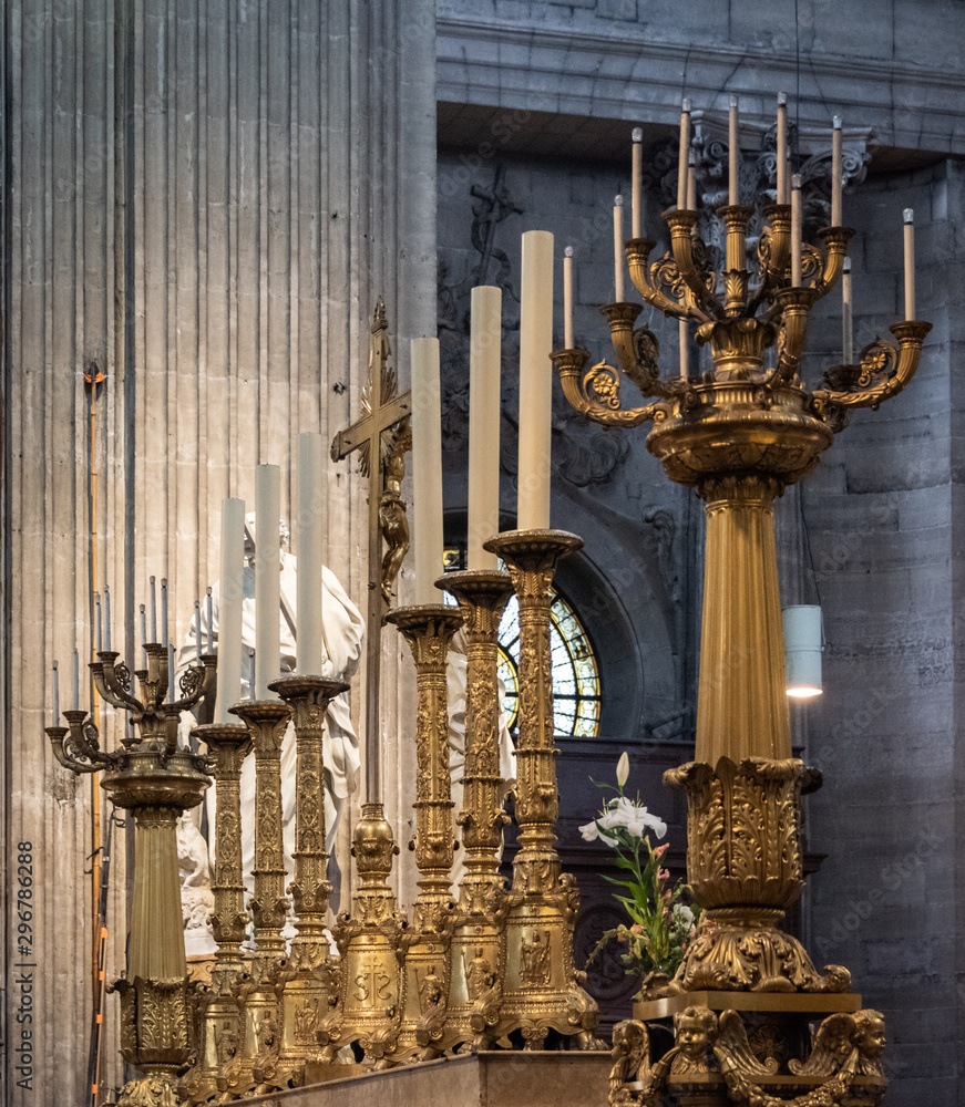 Old ornate, gold candle holders with candles in church Stock Photo Adobe Stock