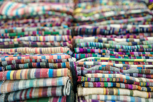 Traditional Indian fabric store. Colorful traditional indian hindi textile fabric wrap scarfs