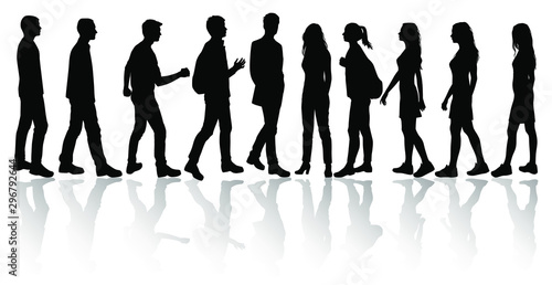 Vector silhouettes men and women standing and walking, different poses,  business  people group, shadow,  black color, isolated on white background