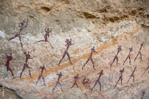 San bushman rock painting of a group of hunters