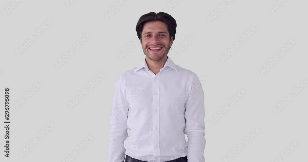 Happy businessman giving thumbs up gesture over white background Happy businessman giving thumbs up gesture over white background