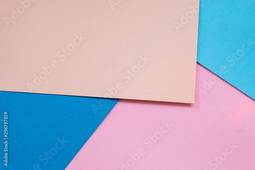 Color papers geometry flat composition background with blue tones