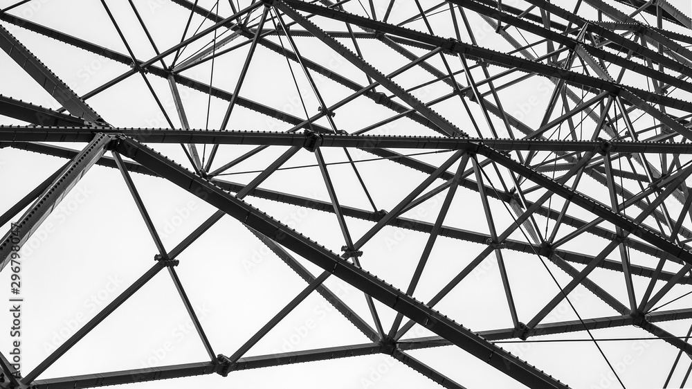 part of a large modern ferris wheel - black and white photo
