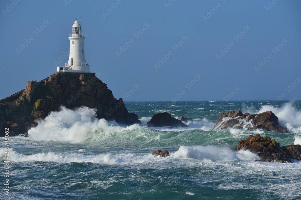 La Corbiere point, Jersey, U.K. Lighthouse in Atlantic weather.