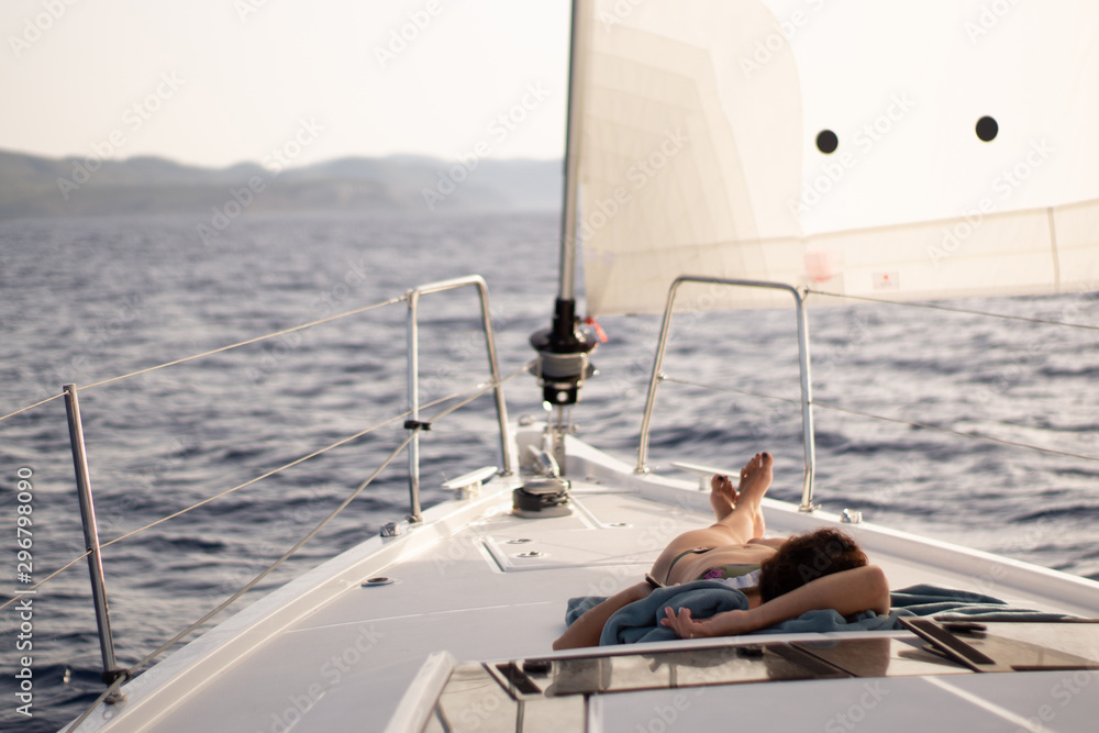 Mediterranean sailboat, view from the yacht to the sea Mediterranean sailboat, view from the yacht to the sea