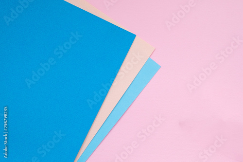 Color papers geometry flat composition background with blue tones