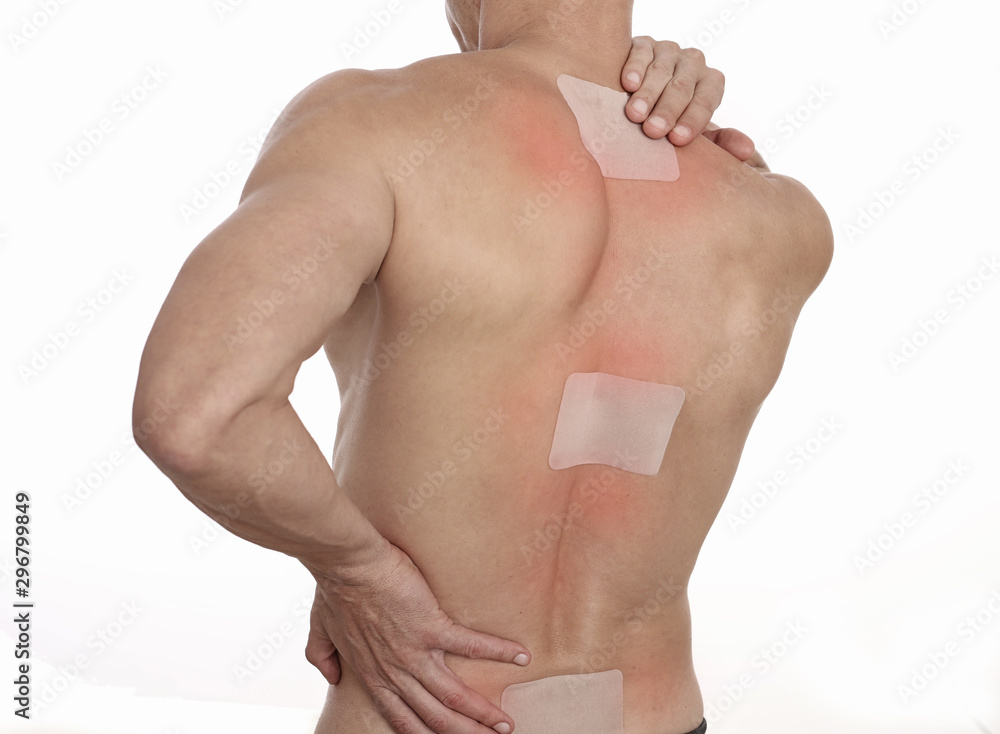 Medicated pain relief patch, plaster. man with back pain. Pain relief and  health care concept isolated on white. Stock Photo | Adobe Stock