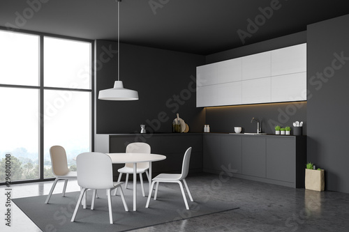 White and gray kitchen corner with dining table
