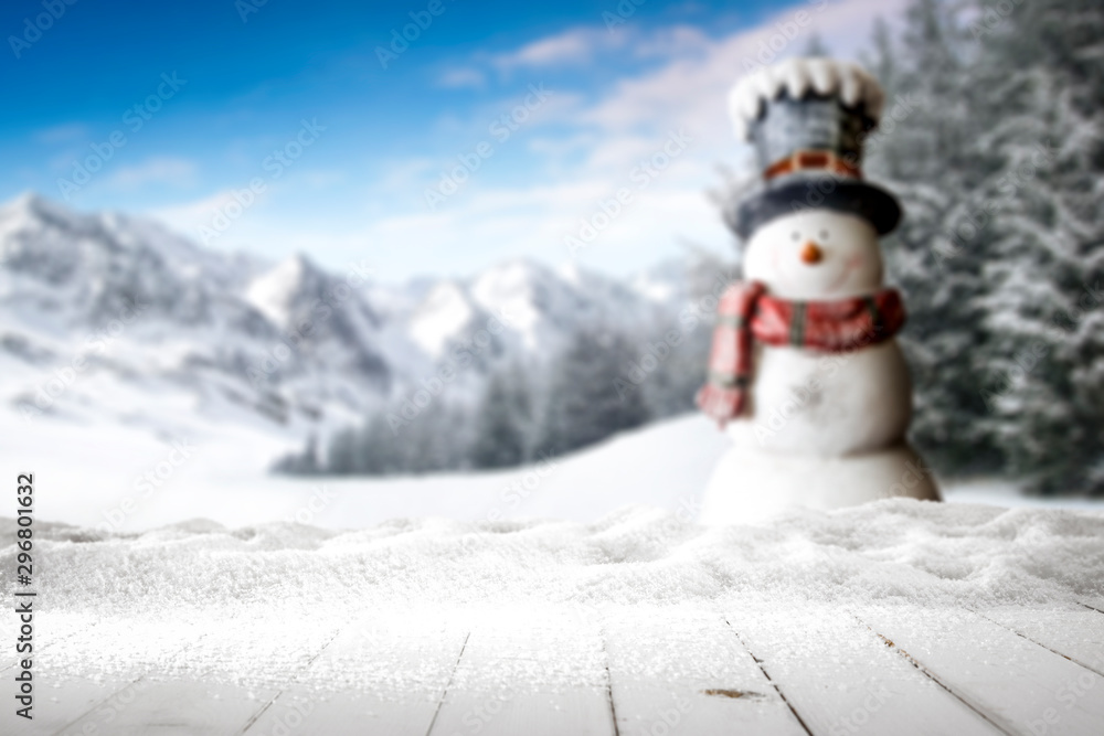 Fototapeta premium Snowy glittering winter landscape with space for products and decorations. Happy Christmas time.