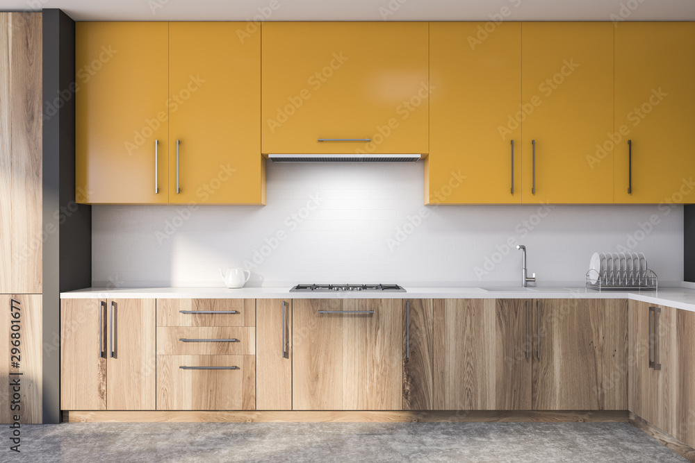Yellow and white kitchen interior with countertops Stock Photo | Adobe
