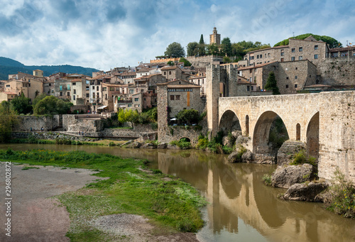 View of the medieval village and fortified bridge of Besal   in the region of La Garrotxa  Girona  Spain .