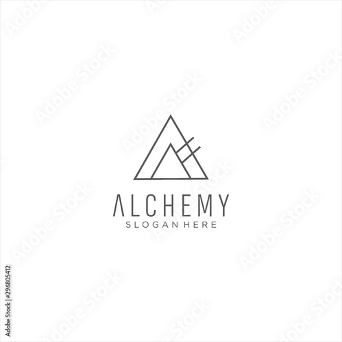 Monogram Triangle Logo . Alchemy Logo Design Vector Stock