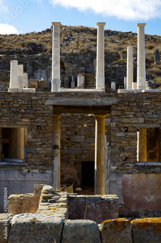  Ancient and historic temple ruins with columns and walls on museum island Delos excavation site in Greece in the Aegean Sea with Apollon Sanctuary photo