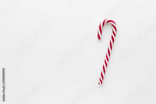 Christmas composition. Candy cane top view background with copy space for your text. Flat lay.