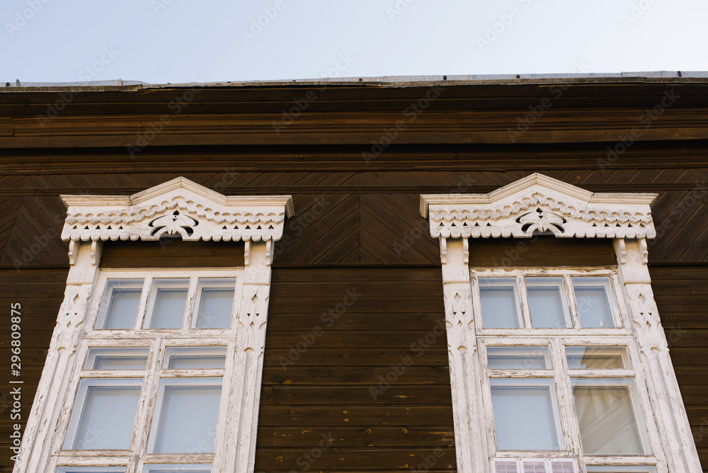 Carved wooden Windows in a wooden house