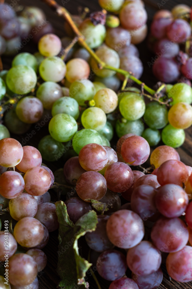 Ripe green and red grapes close-up